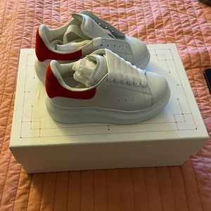 Red and white Alexander Mcqueens sneakers